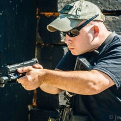 Rich Hart Shooting Instructor Holding Gun