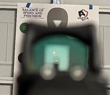 Red dot sign on a target