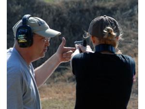 Karl coaches a student on trigger control