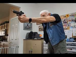 Shooting recoil-enabled Glock 19 pistol indoors